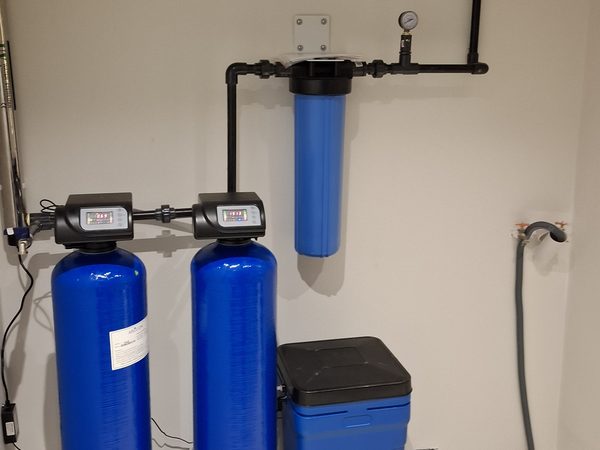 Instalación Aquapur — sistema purificador para 4 baños